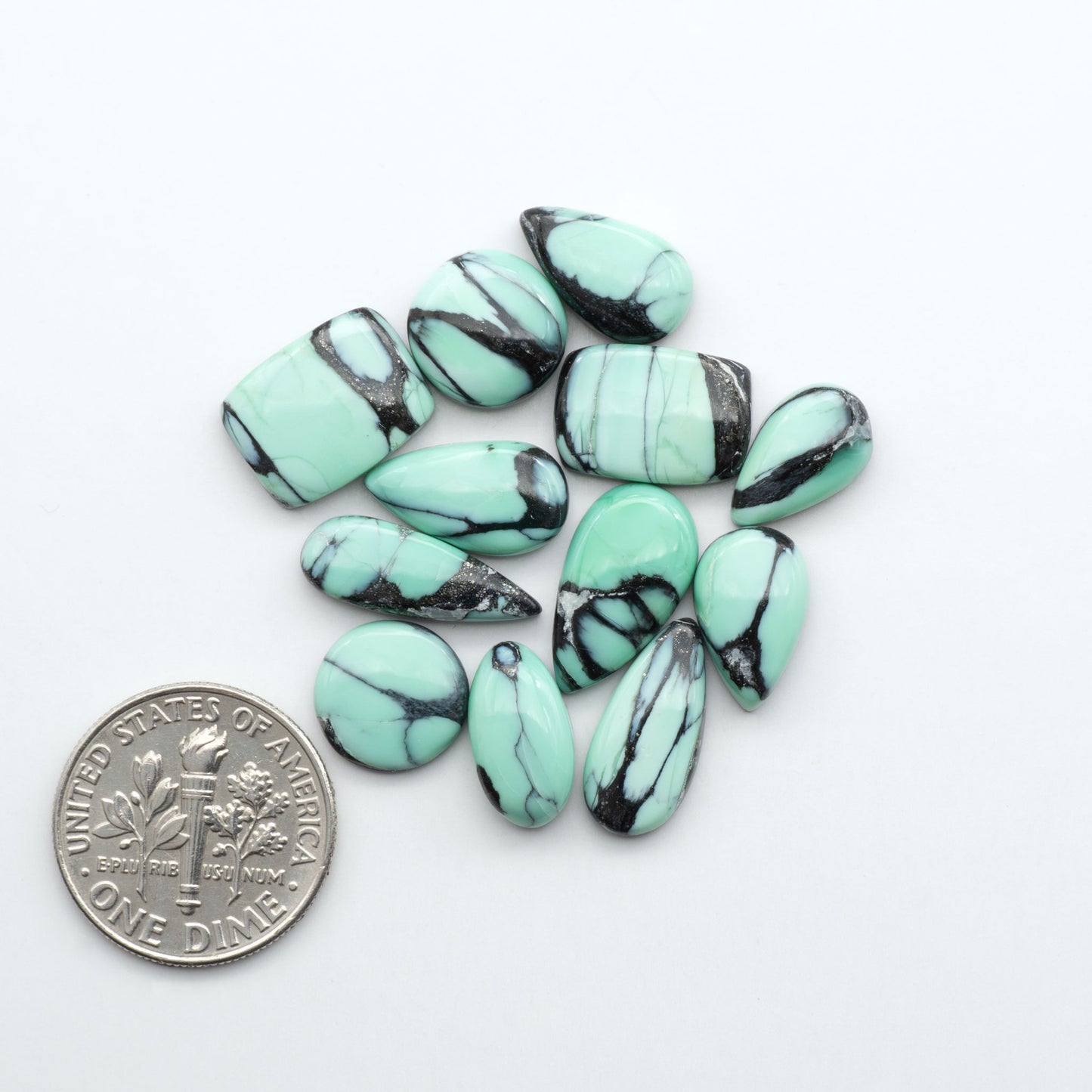 Shop Variscite cabochons with natural matrix patterns, ideal for silversmiths and jewelry makers creating custom rings and pendants.