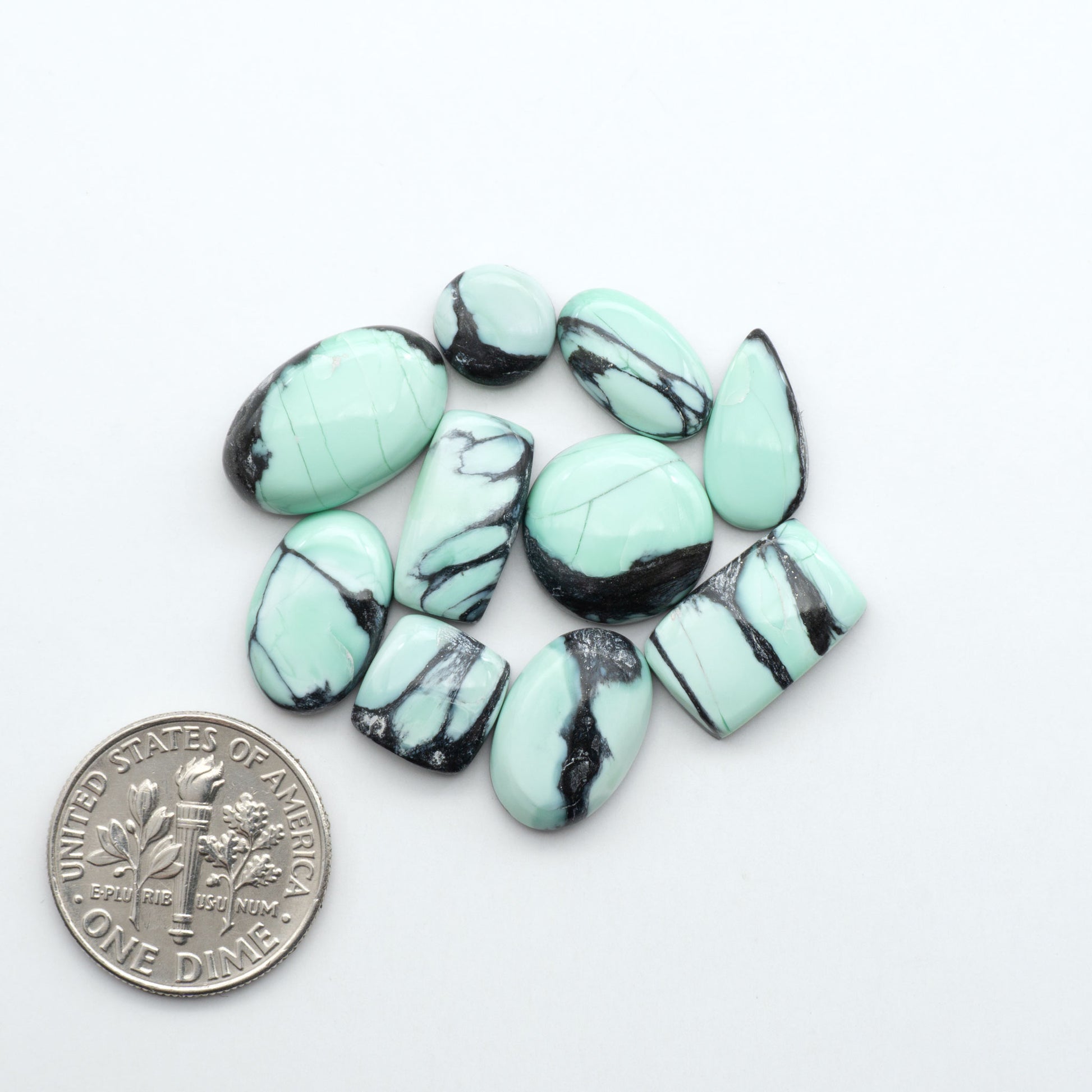 Shop Variscite cabochons with natural matrix patterns, ideal for silversmiths and jewelry makers creating custom rings and pendants.