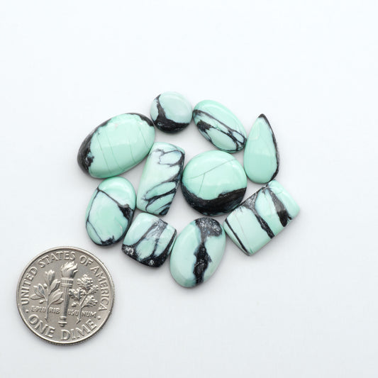 Shop Variscite cabochons with natural matrix patterns, ideal for silversmiths and jewelry makers creating custom rings and pendants.