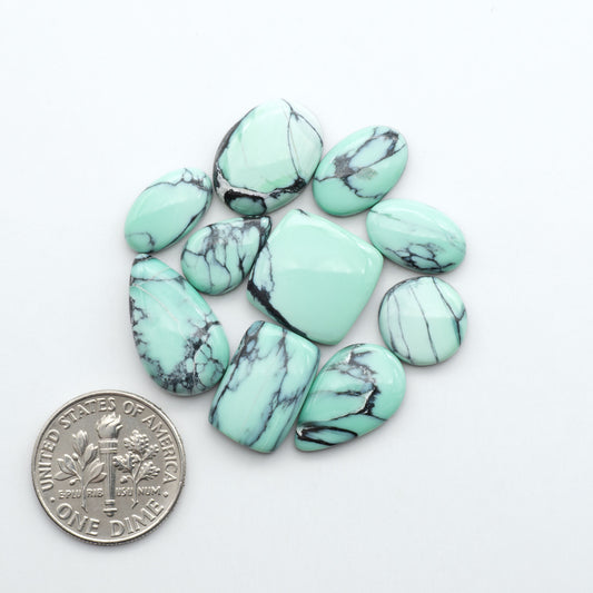 Shop Variscite cabochons with natural matrix patterns, ideal for silversmiths and jewelry makers creating custom rings and pendants.