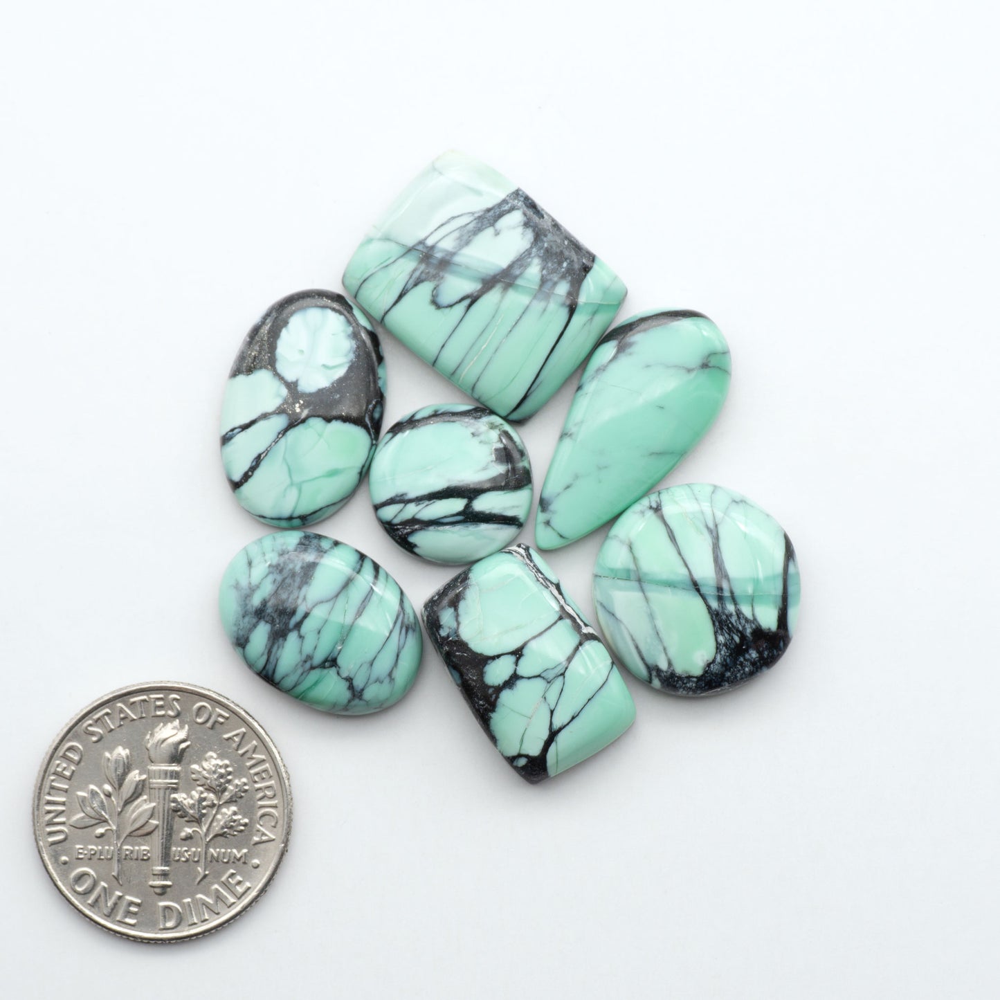 Shop Variscite cabochons with natural matrix patterns, ideal for silversmiths and jewelry makers creating custom rings and pendants.