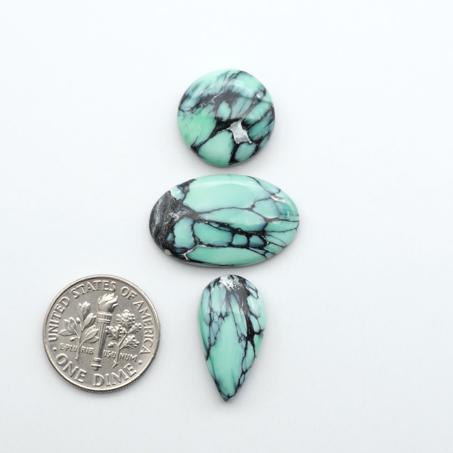 Shop Variscite cabochons with natural matrix patterns, ideal for silversmiths and jewelry makers creating custom rings and pendants.