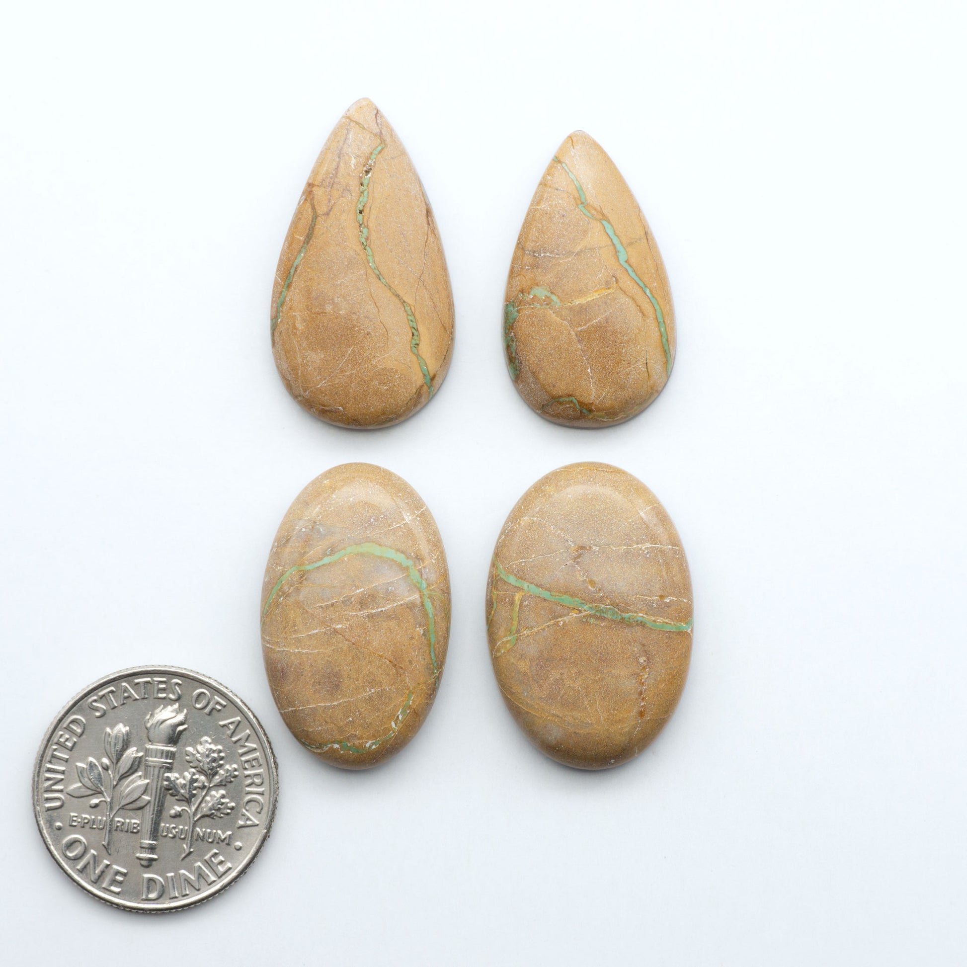 These Crow Springs Ribbon Turquoise Cabochons have a rich color and matrix that are sure to add a unique touch to a variety of jewelry pieces.