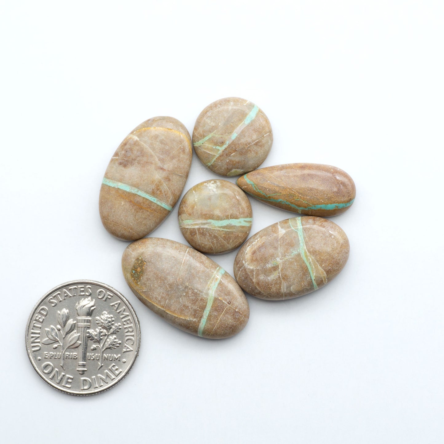 These Crow Springs Ribbon Turquoise Cabochons have a rich color and matrix that are sure to add a unique touch to a variety of jewelry pieces.