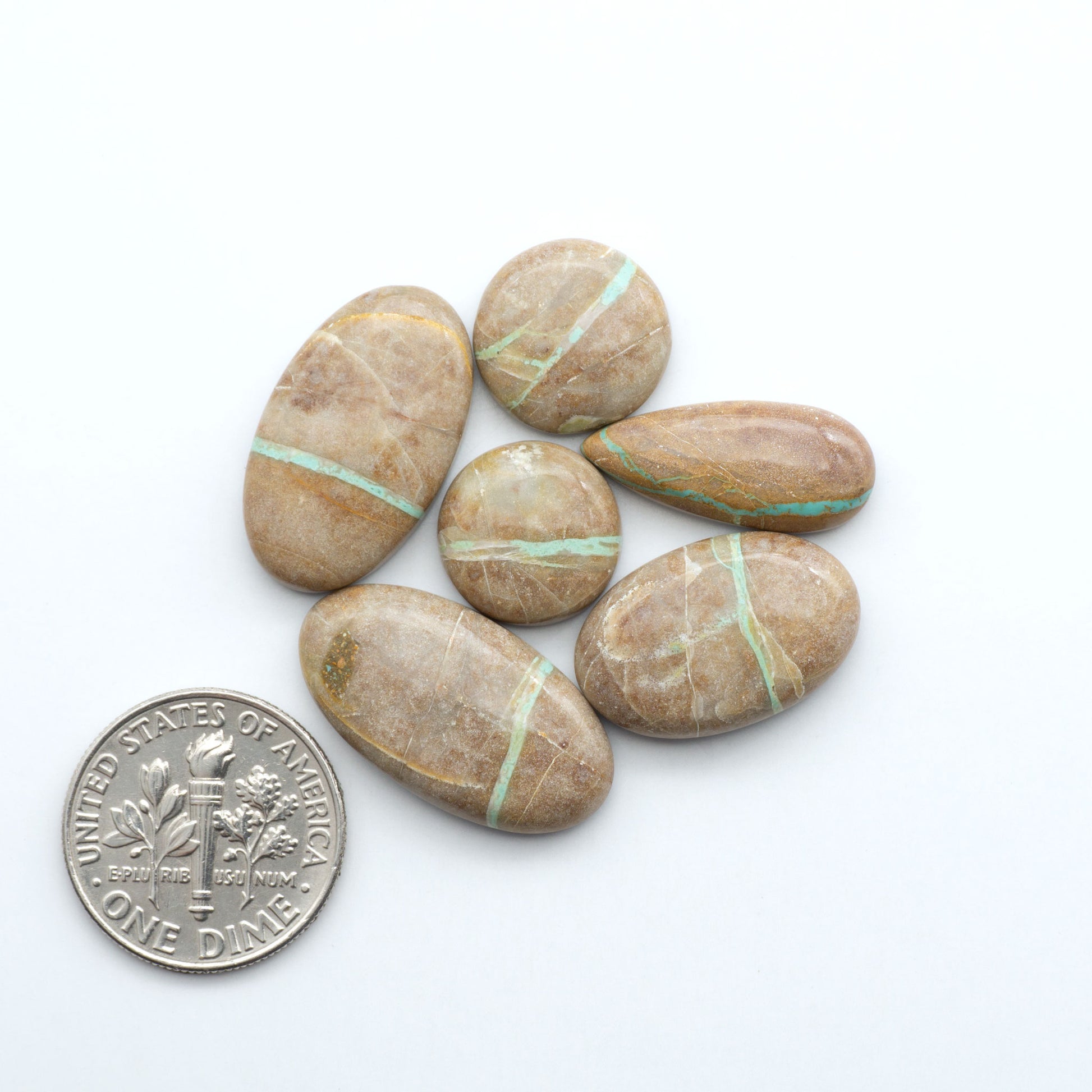 These Crow Springs Ribbon Turquoise Cabochons have a rich color and matrix that are sure to add a unique touch to a variety of jewelry pieces.