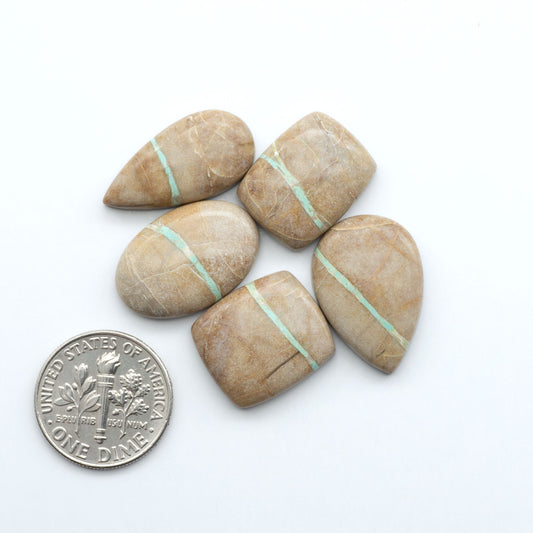 These Crow Springs Ribbon Turquoise Cabochons have a rich color and matrix that are sure to add a unique touch to a variety of jewelry pieces.