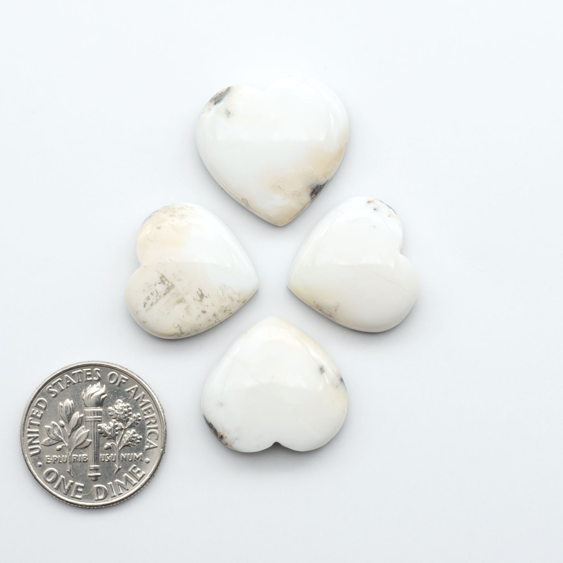 Natural White Buffalo Stone Cabochons are semi-precious gemstones cut into shapes ideal for jewelry-making, making them an excellent choice for artisans