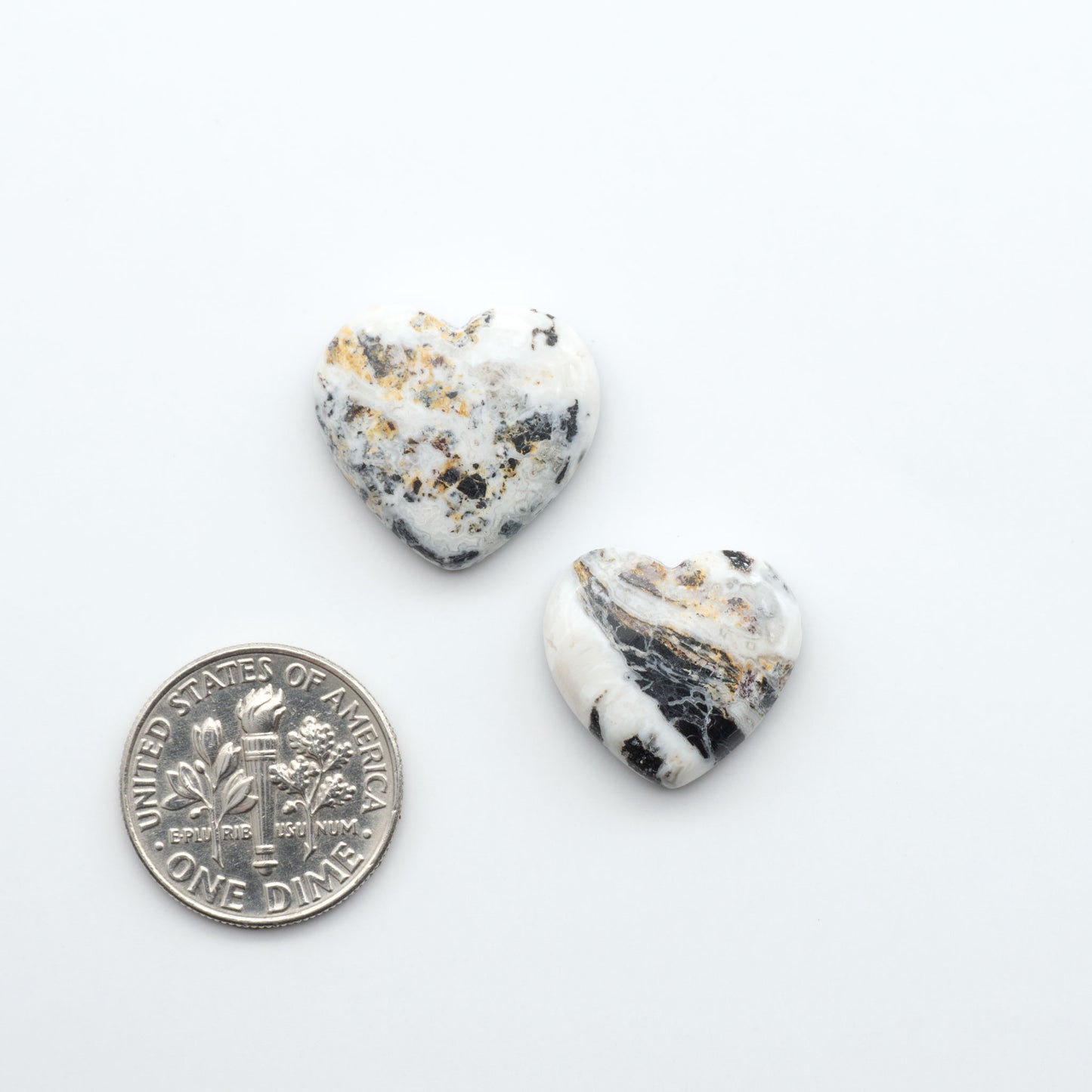 Natural White Buffalo Stone Cabochons are semi-precious gemstones cut into shapes ideal for jewelry-making, making them an excellent choice for artisans