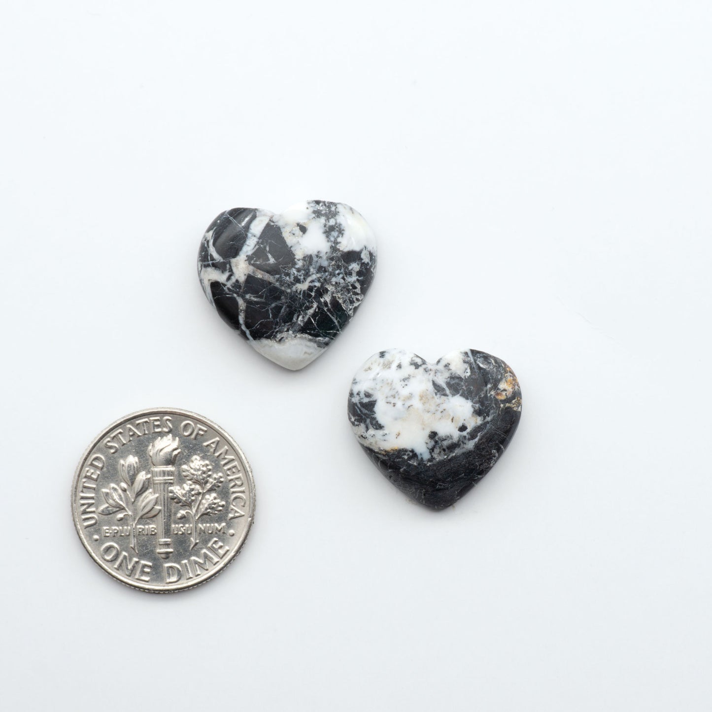 Natural White Buffalo Stone Cabochons are semi-precious gemstones cut into shapes ideal for jewelry-making, making them an excellent choice for artisans