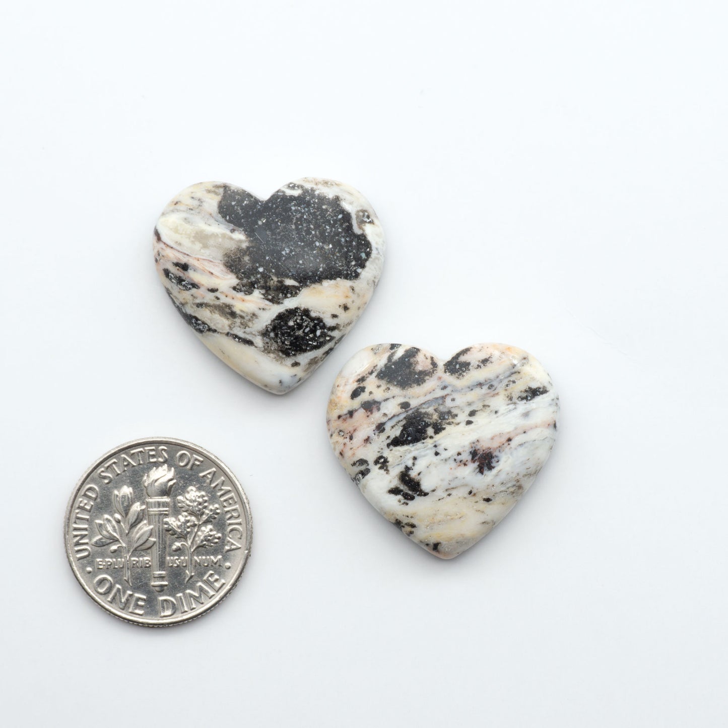 Natural White Buffalo Stone Cabochons are semi-precious gemstones cut into shapes ideal for jewelry-making, making them an excellent choice for artisans