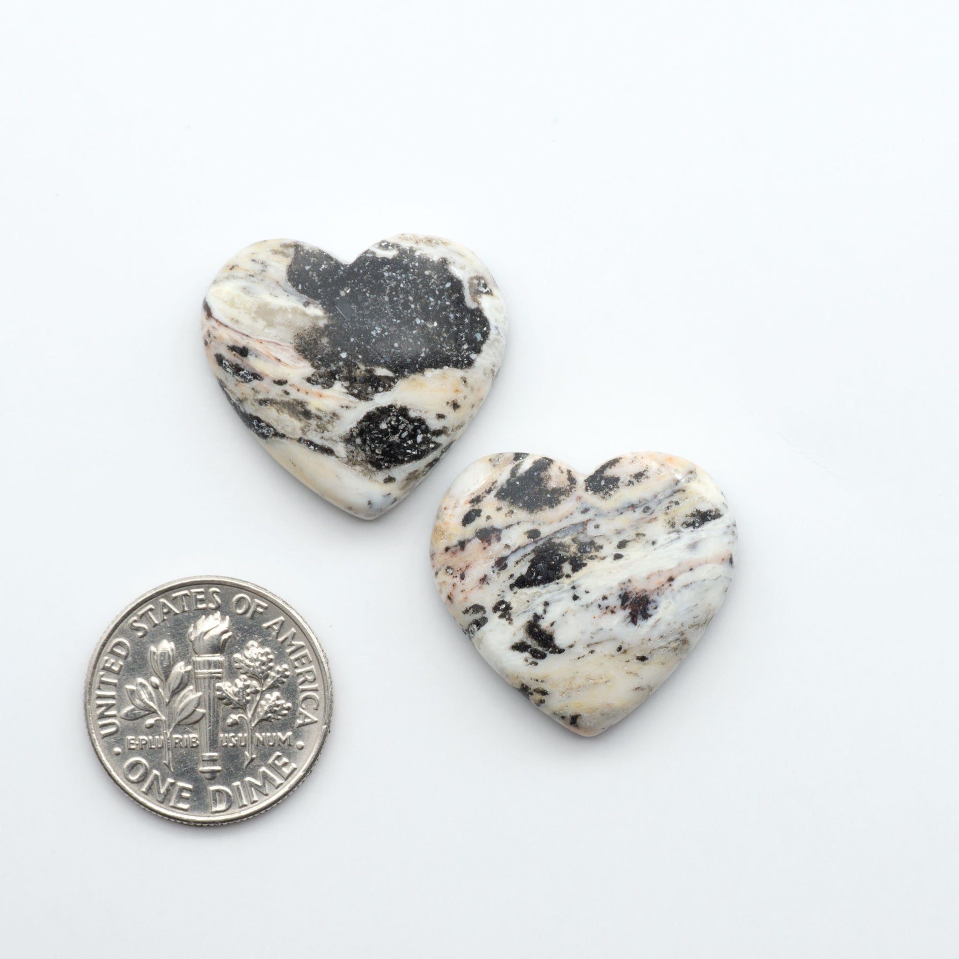 Natural White Buffalo Stone Cabochons are semi-precious gemstones cut into shapes ideal for jewelry-making, making them an excellent choice for artisans