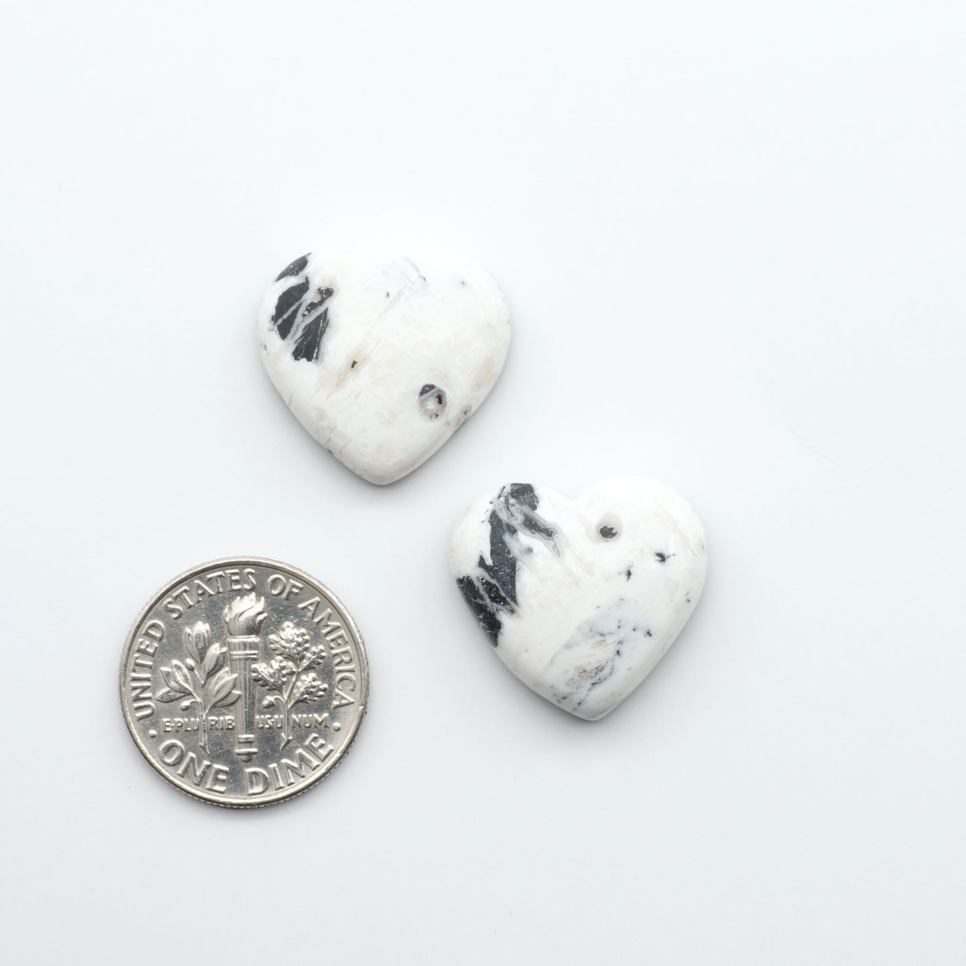 Natural White Buffalo Stone Cabochons are semi-precious gemstones cut into shapes ideal for jewelry-making, making them an excellent choice for artisans