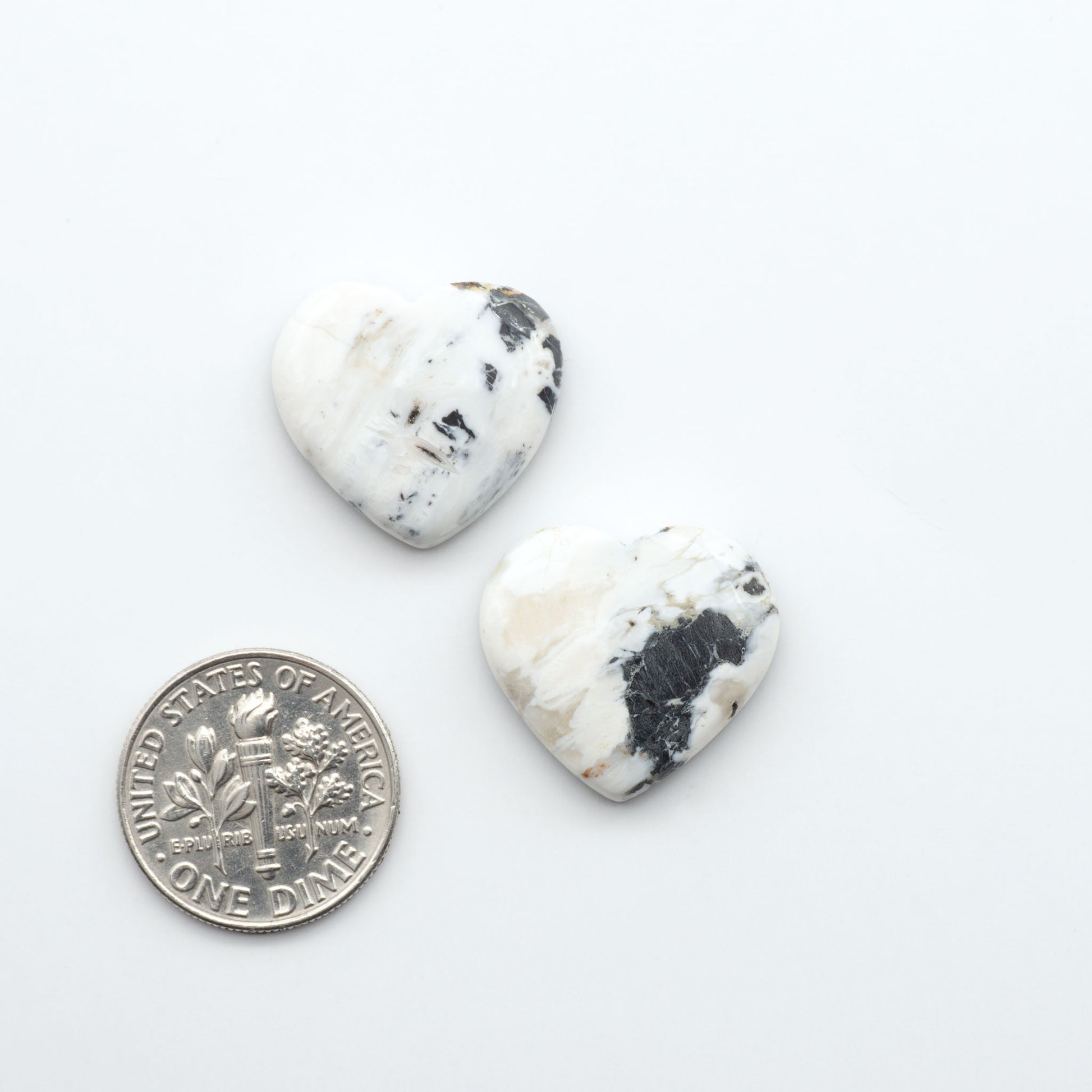 Natural White Buffalo Stone Cabochons are semi-precious gemstones cut into shapes ideal for jewelry-making, making them an excellent choice for artisans