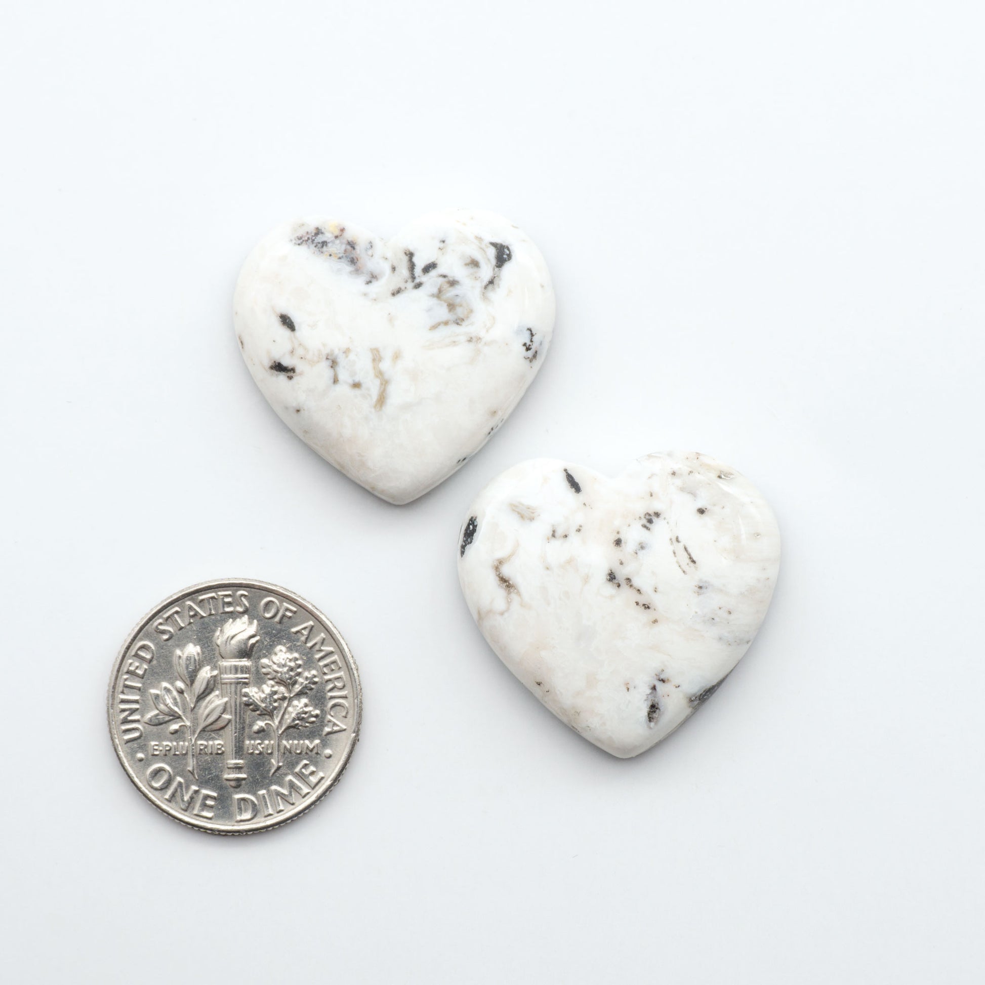 Natural White Buffalo Stone Cabochons are semi-precious gemstones cut into shapes ideal for jewelry-making, making them an excellent choice for artisans