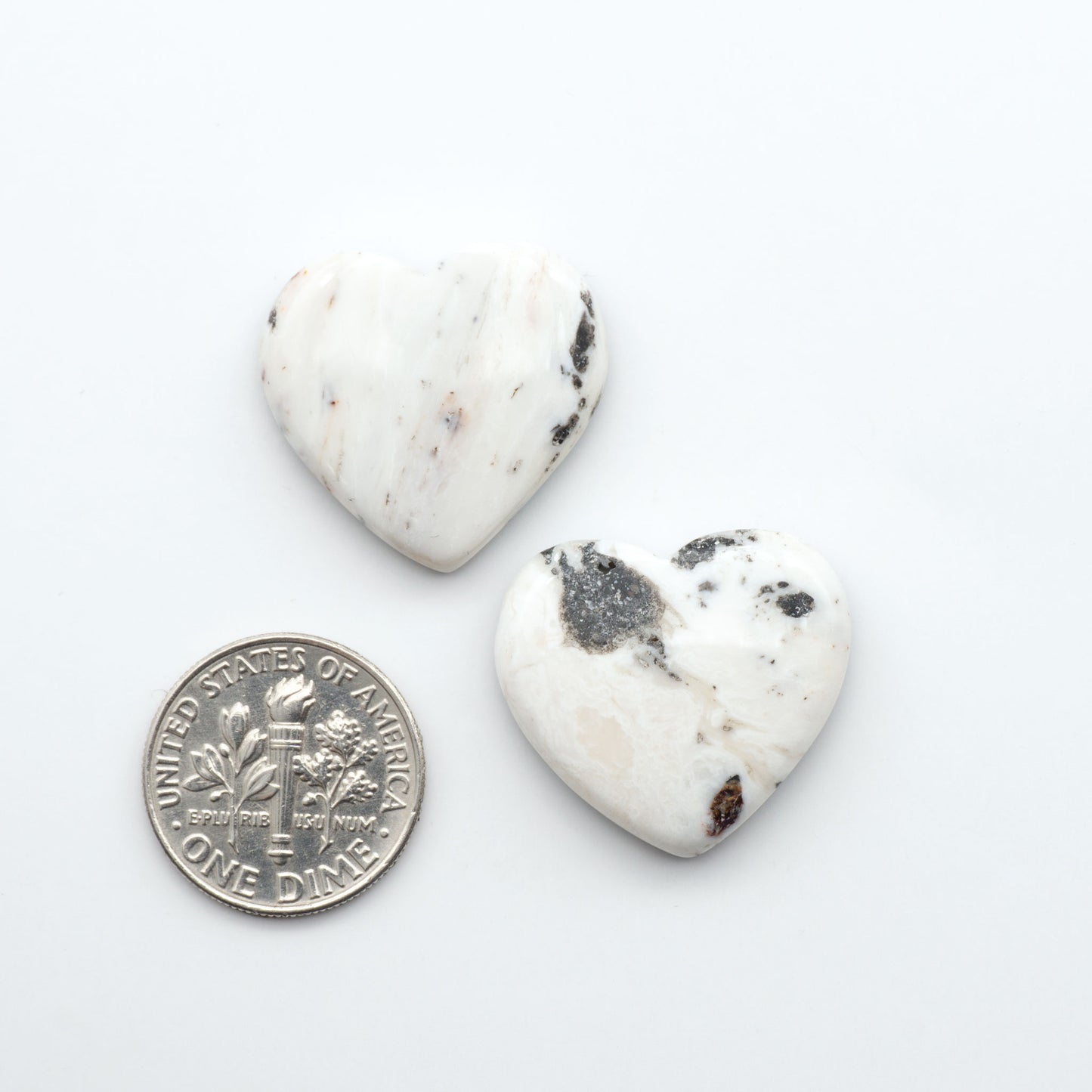 Natural White Buffalo Stone Cabochons are semi-precious gemstones cut into shapes ideal for jewelry-making, making them an excellent choice for artisans