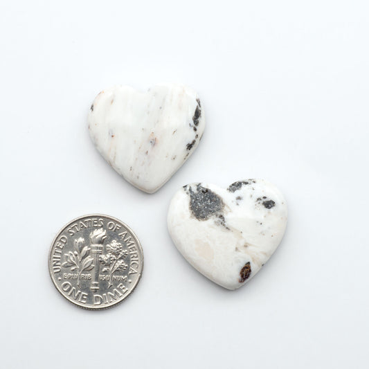 Natural White Buffalo Stone Cabochons are semi-precious gemstones cut into shapes ideal for jewelry-making, making them an excellent choice for artisans