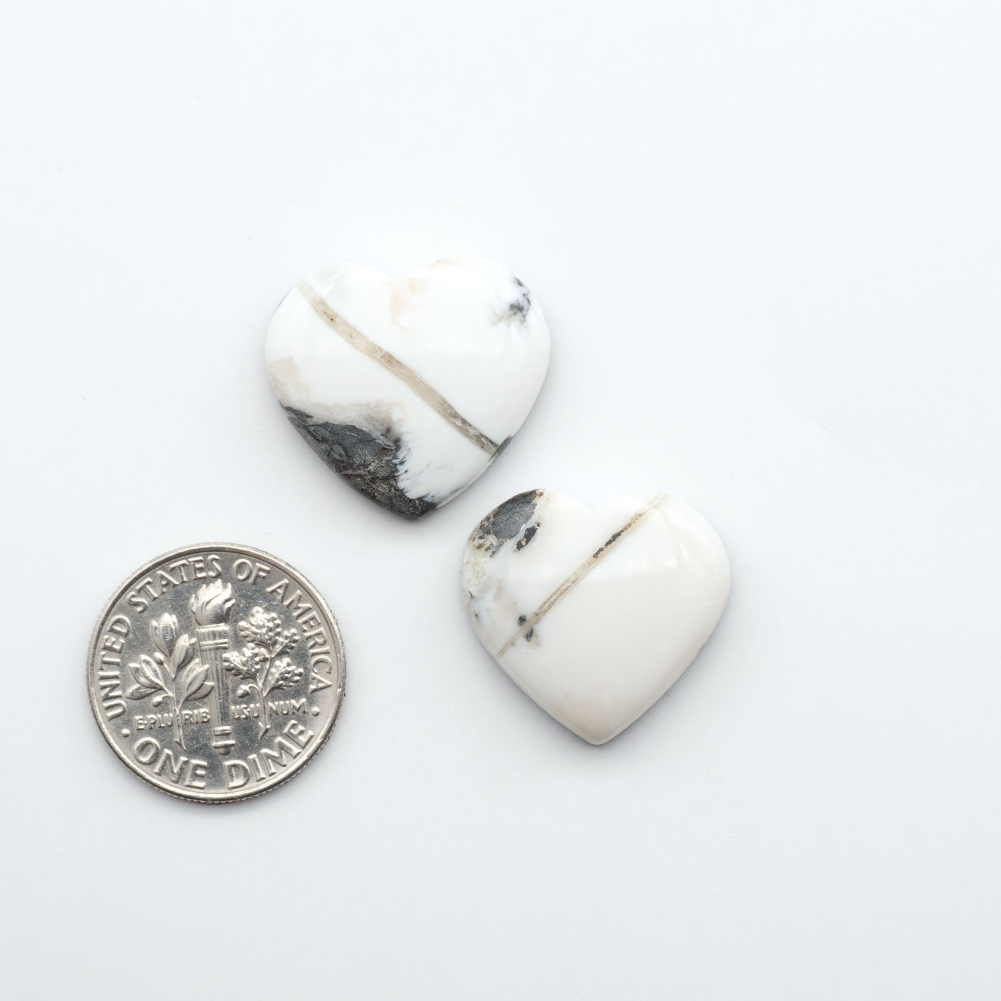 Natural White Buffalo Stone Cabochons are semi-precious gemstones cut into shapes ideal for jewelry-making, making them an excellent choice for artisans