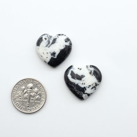 Natural White Buffalo Stone Cabochons are semi-precious gemstones cut into shapes ideal for jewelry-making, making them an excellent choice for artisans