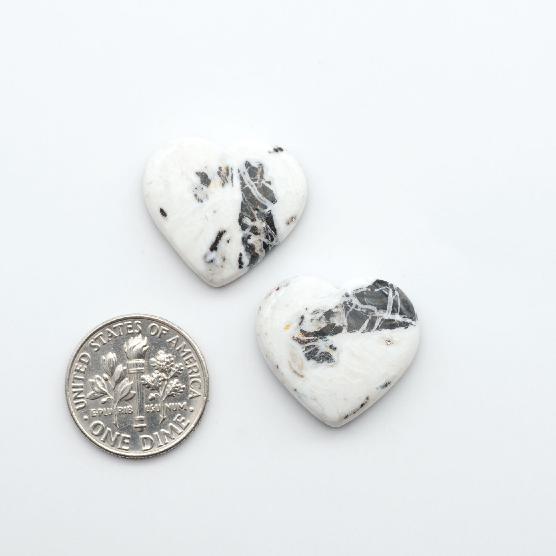 Natural White Buffalo Stone Cabochons are semi-precious gemstones cut into shapes ideal for jewelry-making, making them an excellent choice for artisans