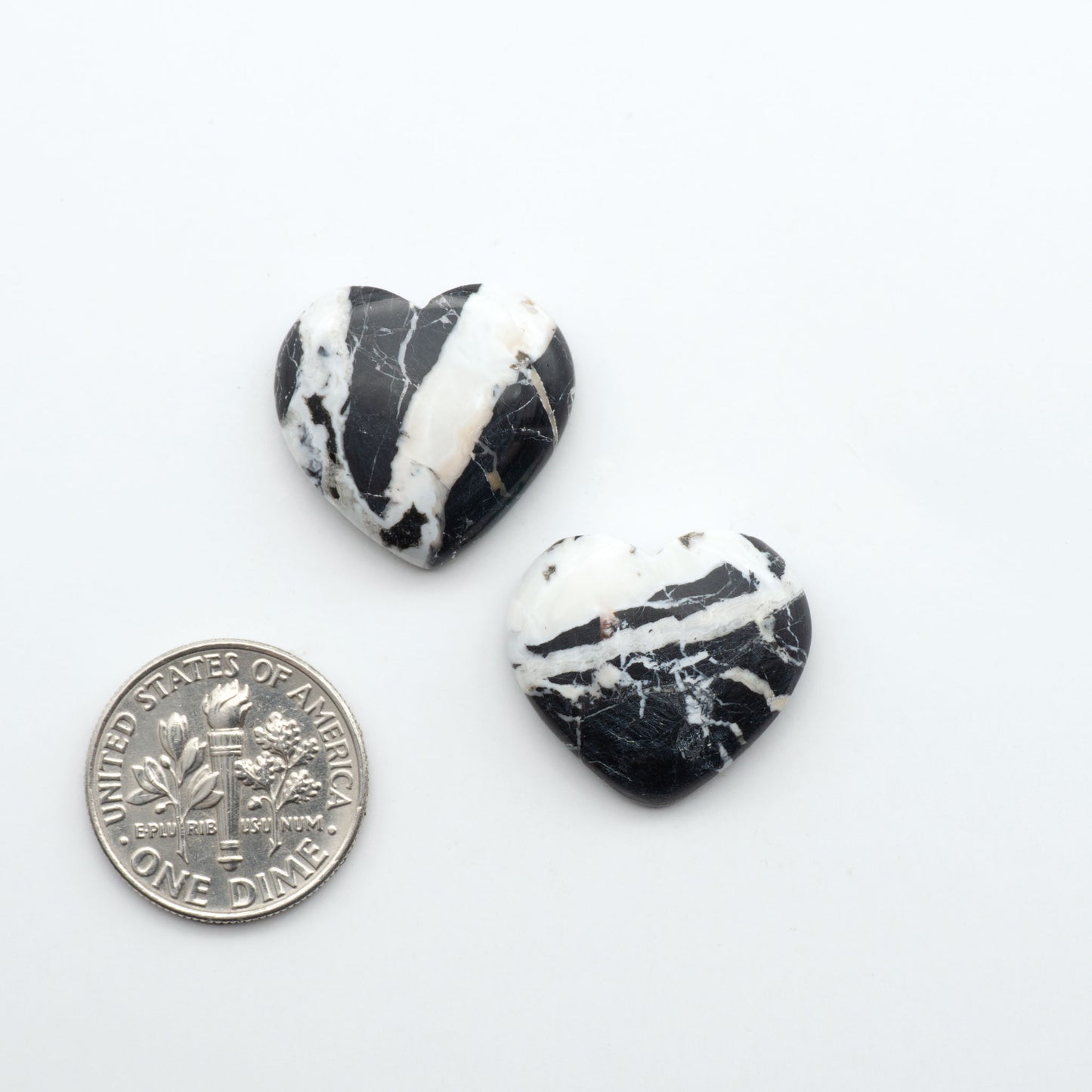 Natural White Buffalo Stone Cabochons are semi-precious gemstones cut into shapes ideal for jewelry-making, making them an excellent choice for artisans