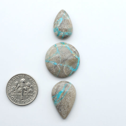 Carico Lake Turquoise cabochons with vibrant aqua-blue to turquoise tones and natural matrix, ideal for rings, pendants, and artisan jewelry.