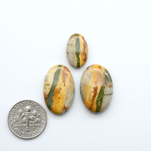 Royston Turquoise cabochons are famous for their distinctive matrix and unique green and blue hues, making them a favored option among jewelry designers.
