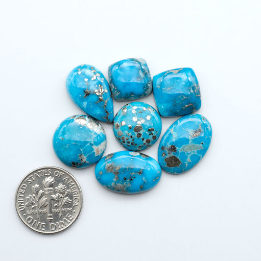 Create stunning handcrafted jewelry with Blue Bird Turquoise Cabochons. Their rich blue color and polish make them perfect for silversmiths and jewelry makers.