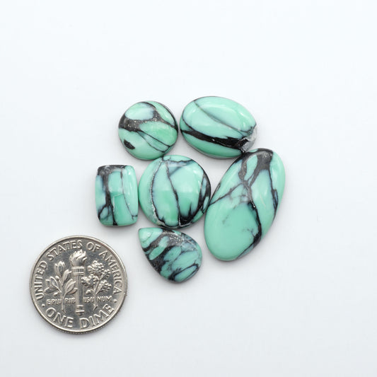 Create stunning handcrafted jewelry with Blue Bird Turquoise Cabochons. Their rich blue color and polish make them perfect for silversmiths and jewelry makers.