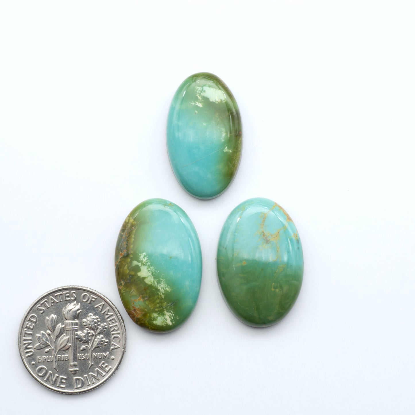 Experience the beauty of Turquoise Mountain Cabochons. With their distinctive blue and green color, these gemstones are perfect for any jewelry piece.