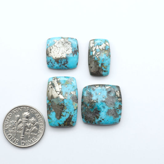 Nacozari turquoise cabochons are striking gemstones known for their vibrant blue to greenish-blue colors and pyrite, these stones are prized in jewelry making.