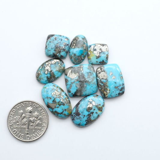 Nacozari turquoise cabochons are striking gemstones known for their vibrant blue to greenish-blue colors and pyrite, these stones are prized in jewelry making.
