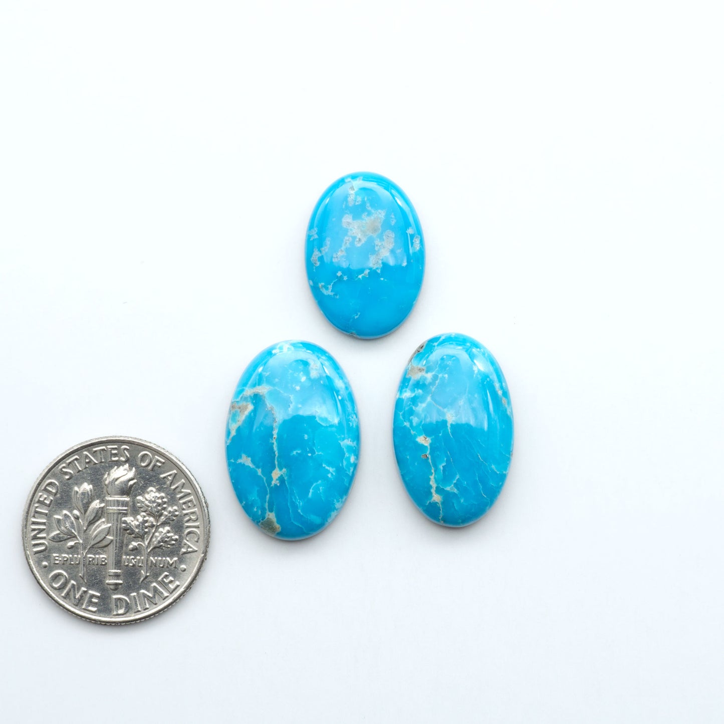 Sierra Bella Turquoise cabochons feature rich blue-green color and natural matrix variation. Ideal for silversmiths, jewelers, and custom jewelry designs.