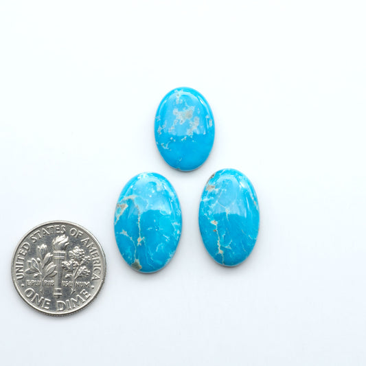 Sierra Bella Turquoise cabochons feature rich blue-green color and natural matrix variation. Ideal for silversmiths, jewelers, and custom jewelry designs.