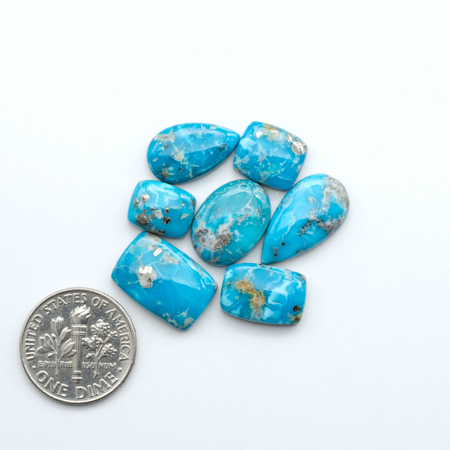 Sierra Bella Turquoise cabochons feature rich blue-green color and natural matrix variation. Ideal for silversmiths, jewelers, and custom jewelry designs.