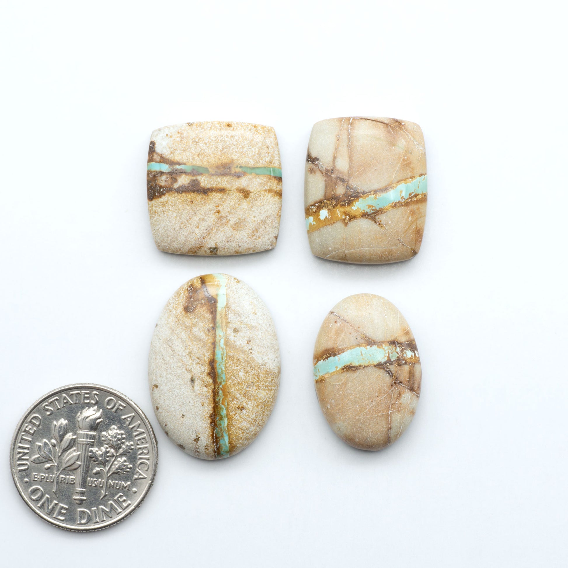 Royston Turquoise cabochons are famous for their distinctive matrix and unique green and blue hues, making them a favored option among jewelry designers.