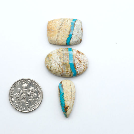 Royston Turquoise cabochons are famous for their distinctive matrix and unique green and blue hues, making them a favored option among jewelry designers.