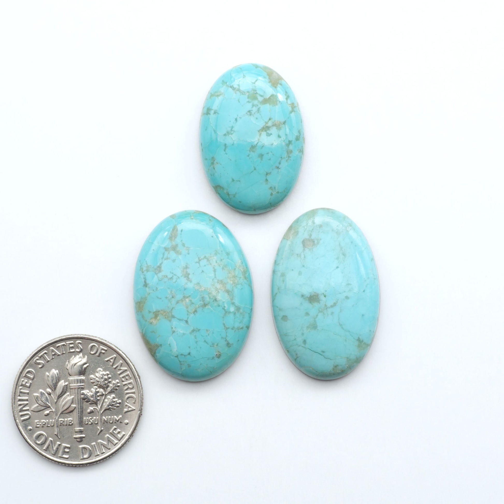 Add a touch of beauty to your collection with our stunning Pilot Mountain Turquoise Cabochons. Perfect for jewelry making each piece is truly one-of-a-kind.
