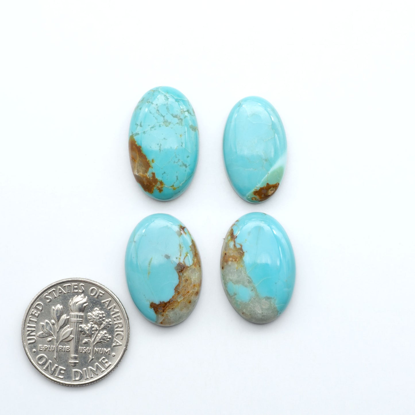 Add a touch of beauty to your collection with our stunning Pilot Mountain Turquoise Cabochons. Perfect for jewelry making each piece is truly one-of-a-kind.