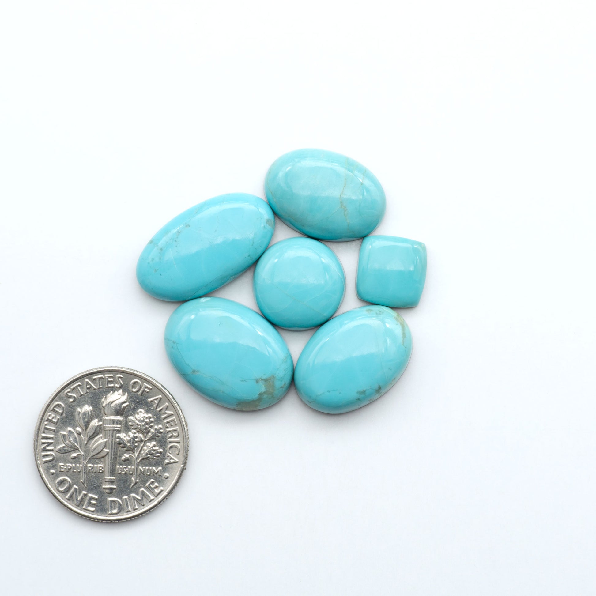 Add a touch of beauty to your collection with our stunning Pilot Mountain Turquoise Cabochons. Perfect for jewelry making each piece is truly one-of-a-kind.