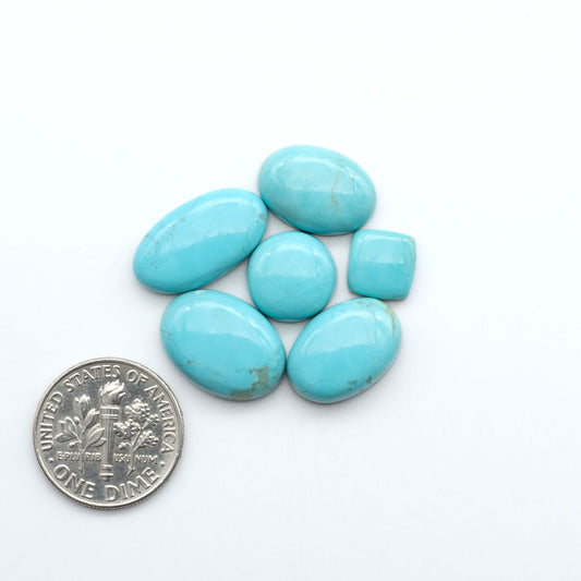 Add a touch of beauty to your collection with our stunning Pilot Mountain Turquoise Cabochons. Perfect for jewelry making each piece is truly one-of-a-kind.