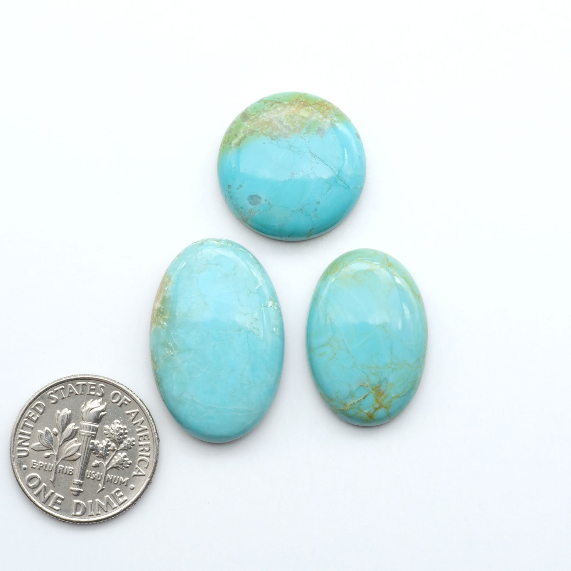 Add a touch of beauty to your collection with our stunning Pilot Mountain Turquoise Cabochons. Perfect for jewelry making each piece is truly one-of-a-kind.