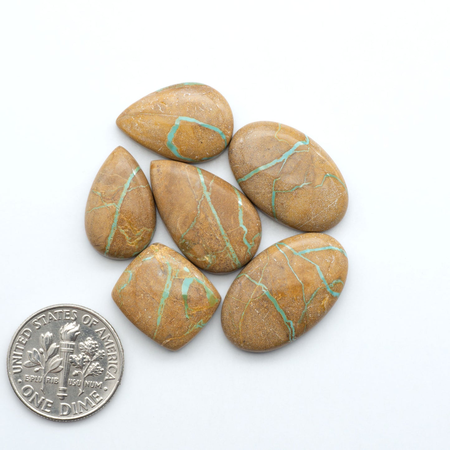These Crow Springs Ribbon Turquoise Cabochons have a rich color and matrix that are sure to add a unique touch to a variety of jewelry pieces.
