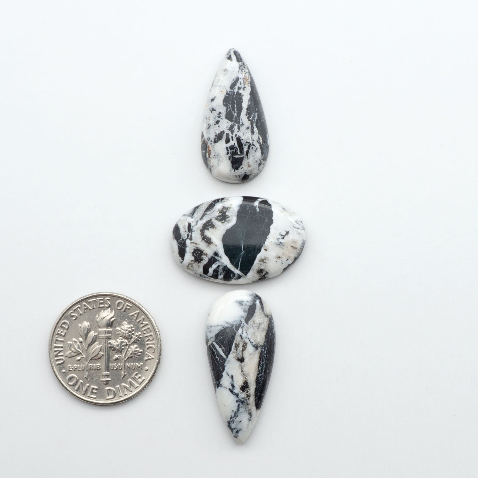 Natural White Buffalo Stone Cabochons are semi-precious gemstones cut into shapes ideal for jewelry-making, making them an excellent choice for artisans.