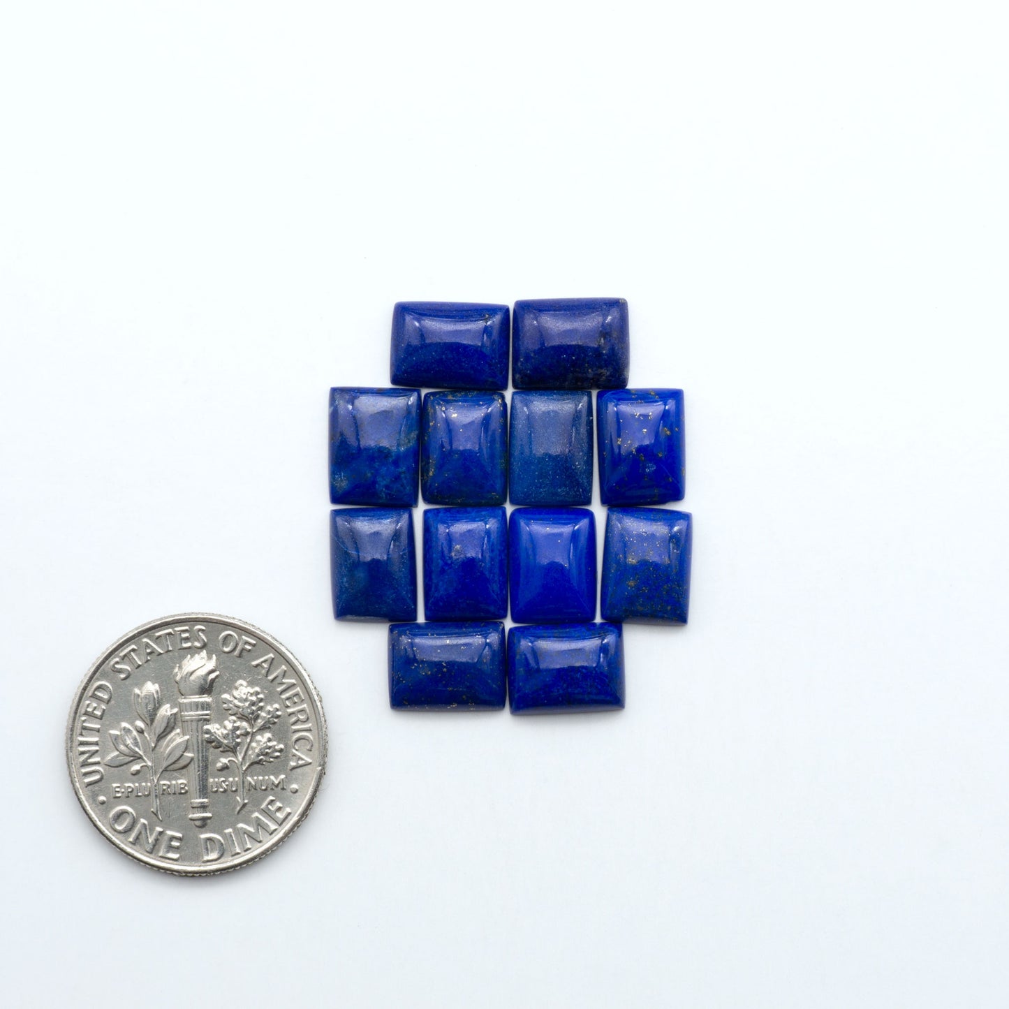 Shop natural Lapis Lazuli cabochons with rich blue tones and golden pyrite, perfect for silversmiths and jewelry makers designing custom pieces.