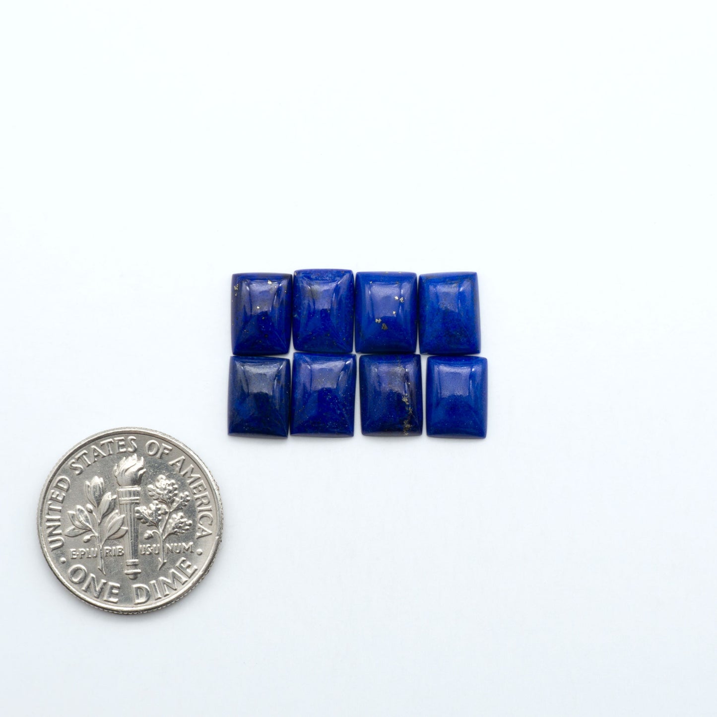 Shop natural Lapis Lazuli cabochons with rich blue tones and golden pyrite, perfect for silversmiths and jewelry makers designing custom pieces.