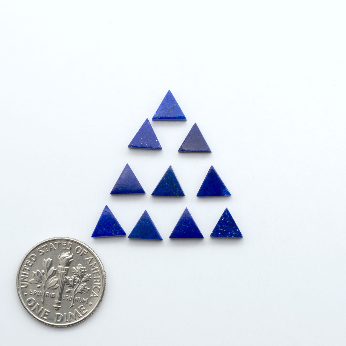 Shop natural Lapis Lazuli cabochons with rich blue tones and golden pyrite, perfect for silversmiths and jewelry makers designing custom pieces.