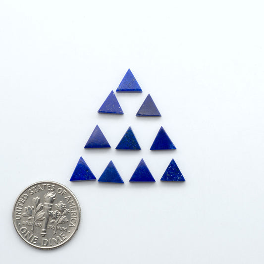 Shop natural Lapis Lazuli cabochons with rich blue tones and golden pyrite, perfect for silversmiths and jewelry makers designing custom pieces.