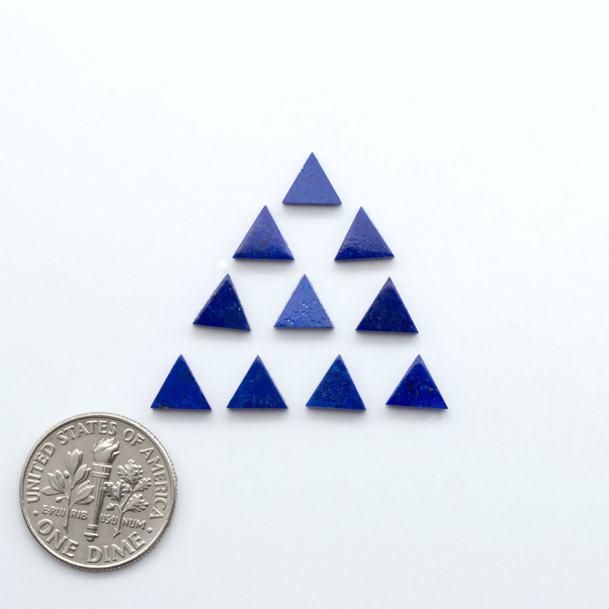 Shop natural Lapis Lazuli cabochons with rich blue tones and golden pyrite, perfect for silversmiths and jewelry makers designing custom pieces.