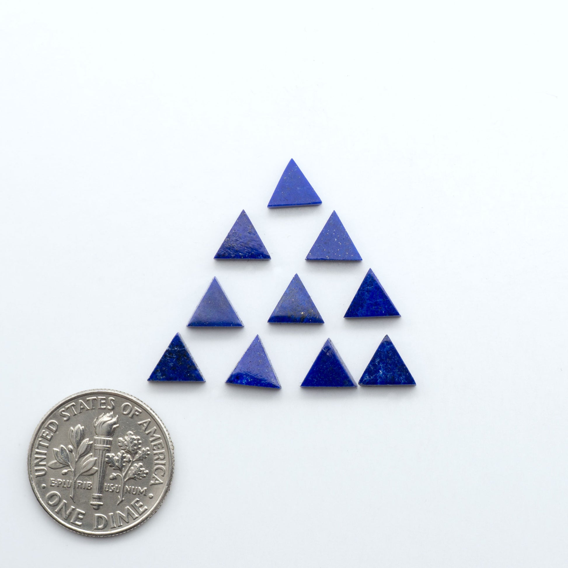 Shop natural Lapis Lazuli cabochons with rich blue tones and golden pyrite, perfect for silversmiths and jewelry makers designing custom pieces.