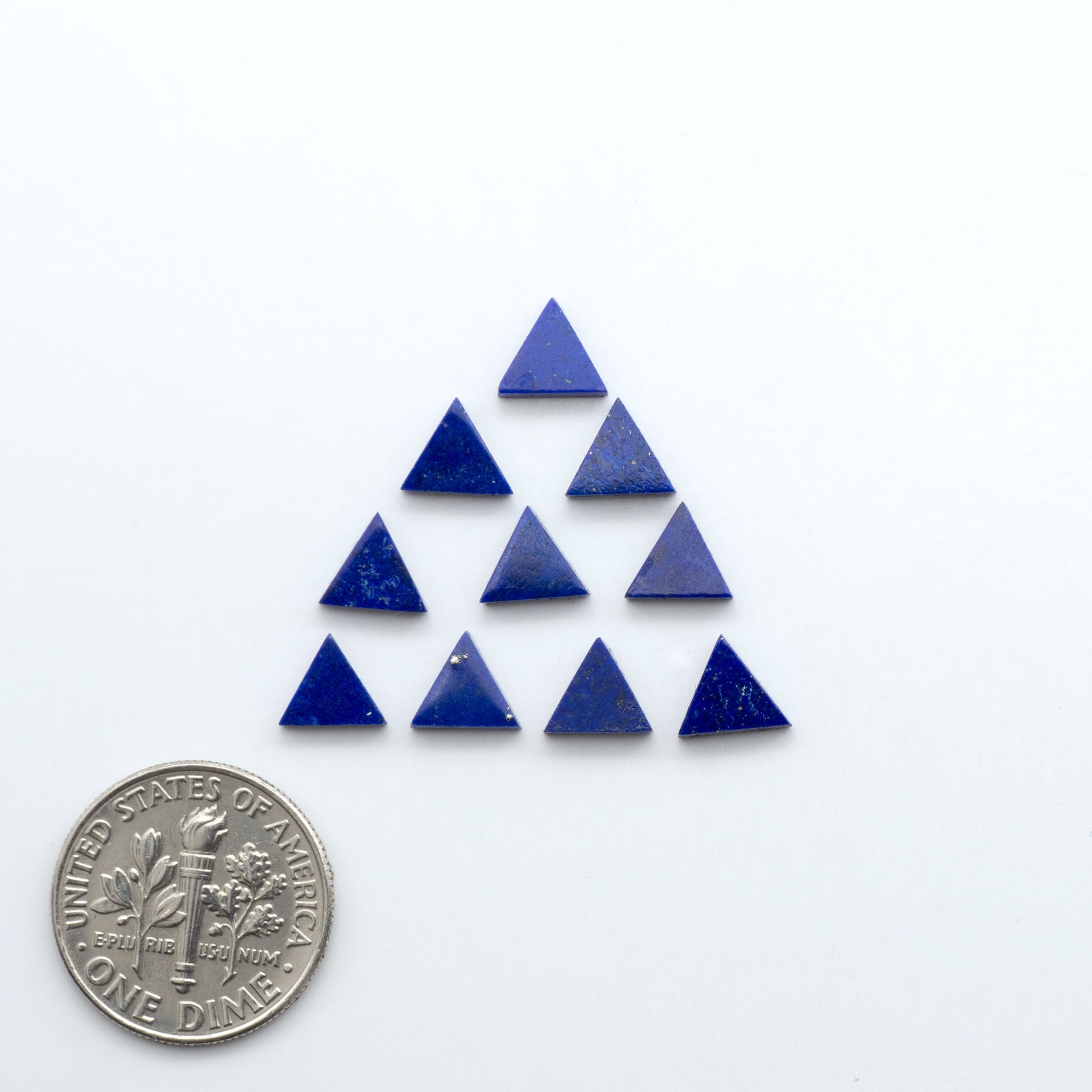 Shop natural Lapis Lazuli cabochons with rich blue tones and golden pyrite, perfect for silversmiths and jewelry makers designing custom pieces.